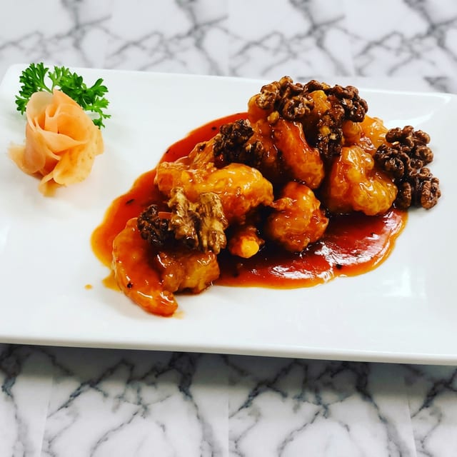 Crispy Prawns Szechuan Style with Glazed Walnuts.